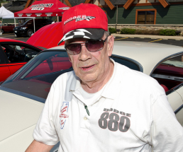 David Dehart stands next to his 1964 Dodge Custom 880.